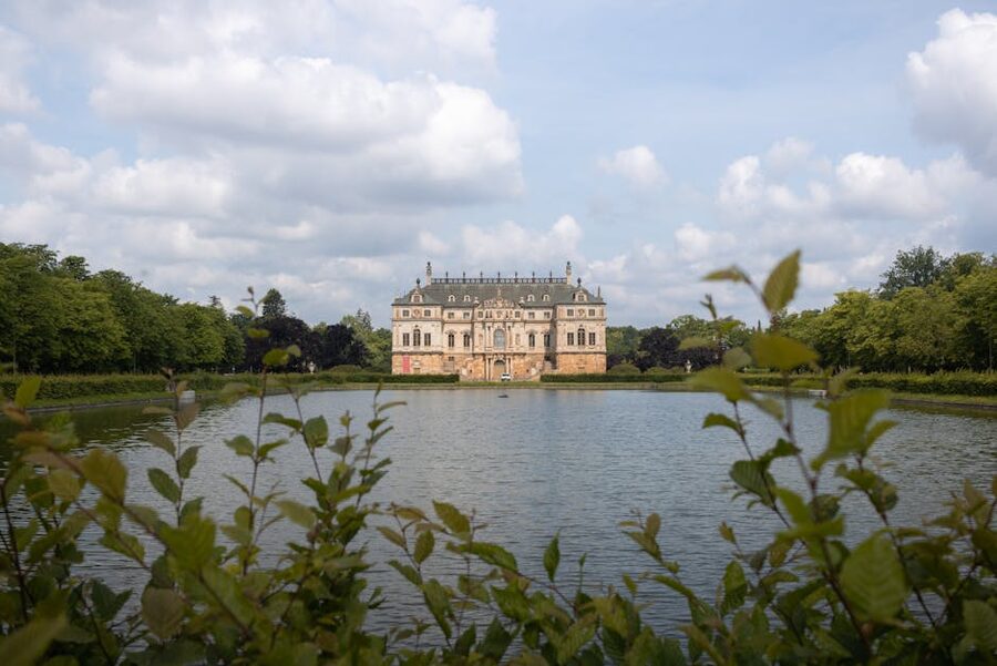 Pillnitz Castle in Dresden surrounded by lush greenery