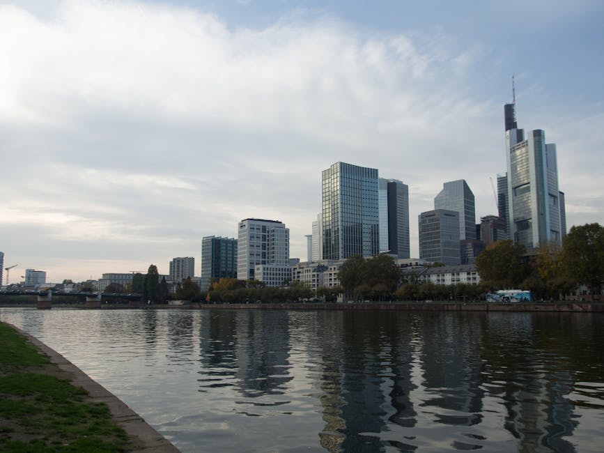 Frankfurt skyscrapers reflecting in the Main River from the water