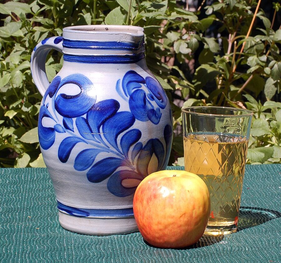 Apfelwein in Geripptes glass with Bembel jug Frankfurt