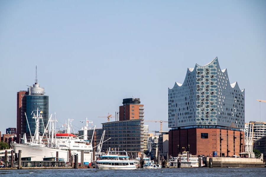 Elbphilharmonie wave-shaped roof rising above the Hamburg cityscape