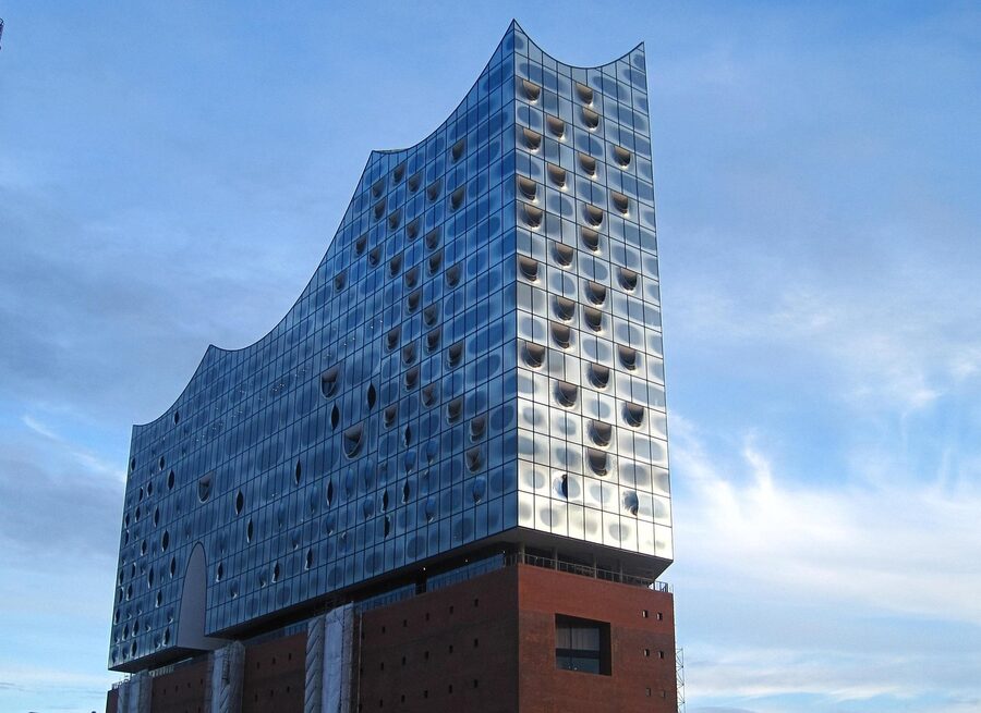 Elbphilharmonie glass facade detail with port crane behind