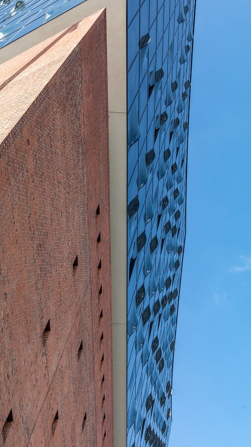 Elbphilharmonie wave roof and brick warehouse base from below
