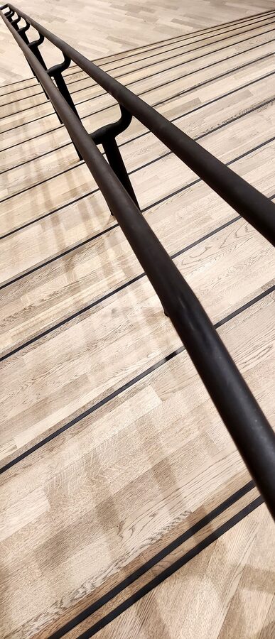 Curved white railing inside the Elbphilharmonie