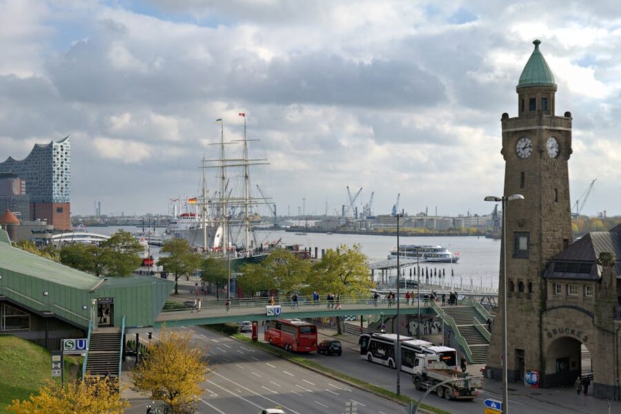 Busy Hamburg harbor with Elbphilharmonie and historic ships