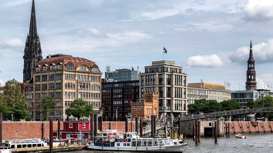 Hamburg harbor and skyline panorama with boats
