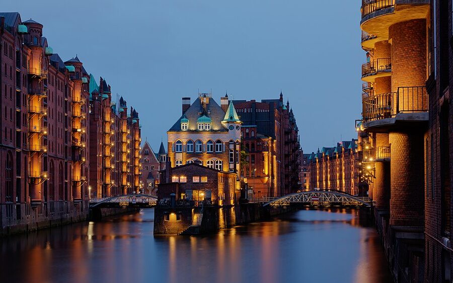 Speicherstadt Wasserschloss with red brick warehouses around the canal