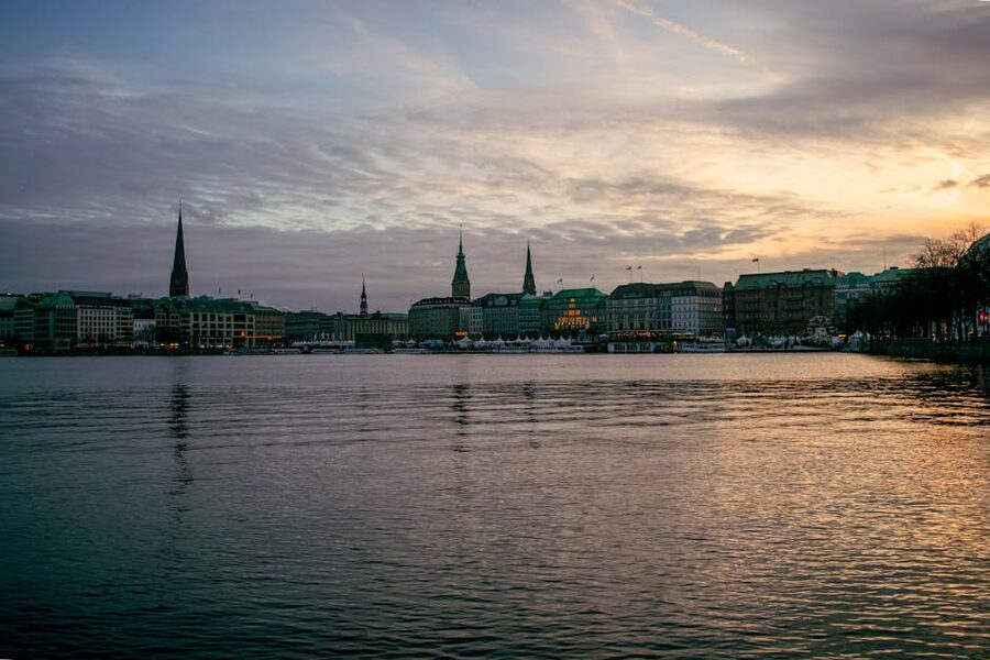Hamburg skyline at dusk over River Alster