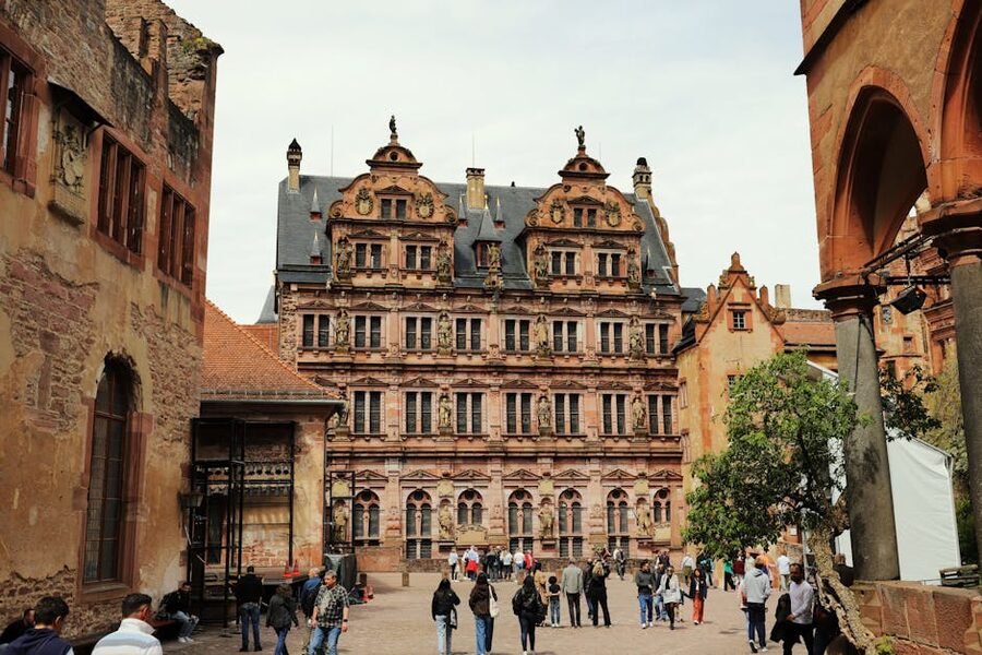 Visitors in the Renaissance courtyard of Heidelberg Castle