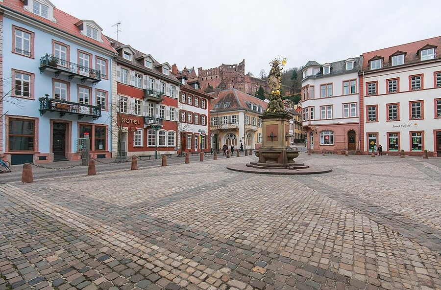 Kornmarkt Heidelberg with Madonna statue and castle behind