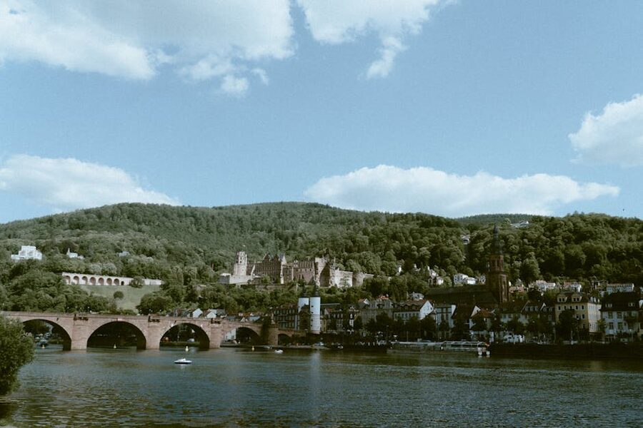 Heidelberg historic bridge with castle and hill behind