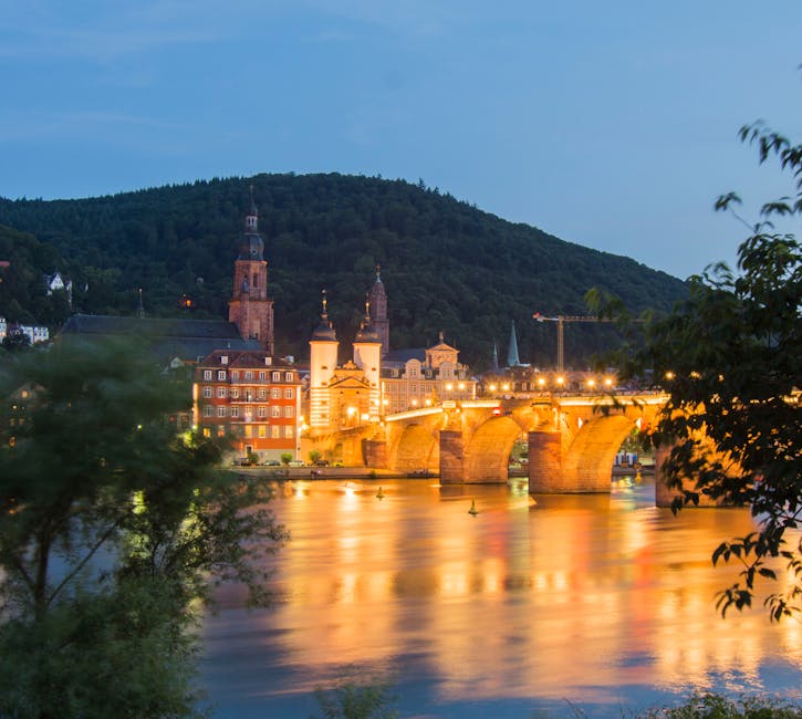 Heidelberg Old Bridge illuminated at twilight on the Neckar