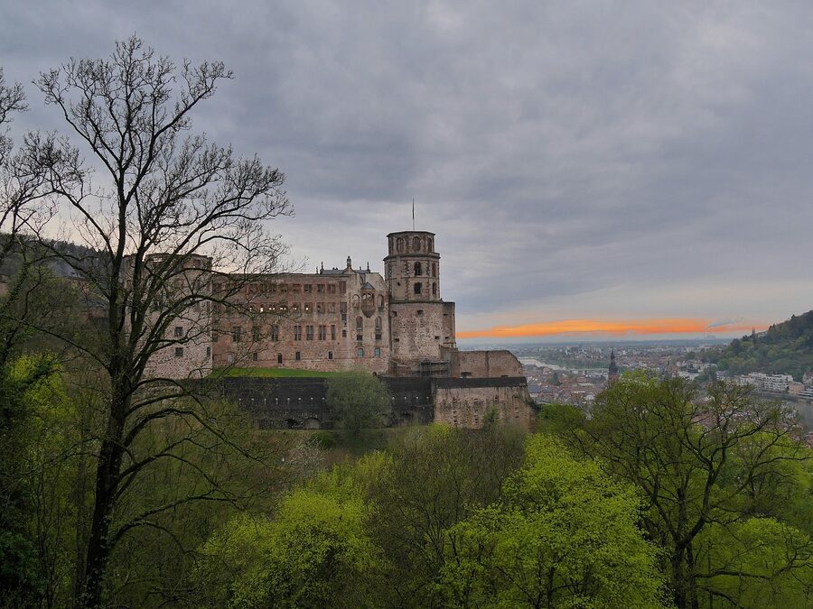 Heidelberg castle and Neckar at sunset from Karlstor