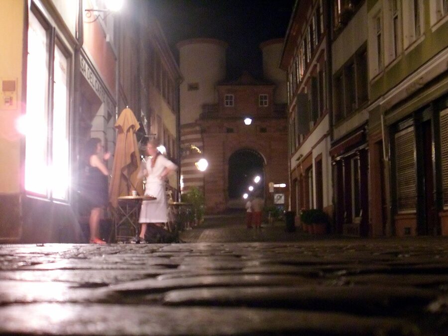 Heidelberg Old Town cobblestone alley at night