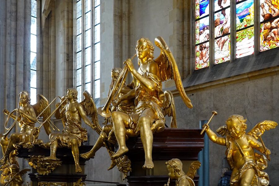 St Barbara Cathedral interior golden statues stained glass