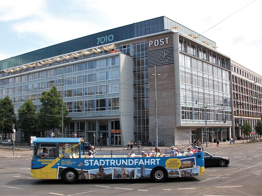 Leipzig sightseeing bus passing the Hauptpostamt