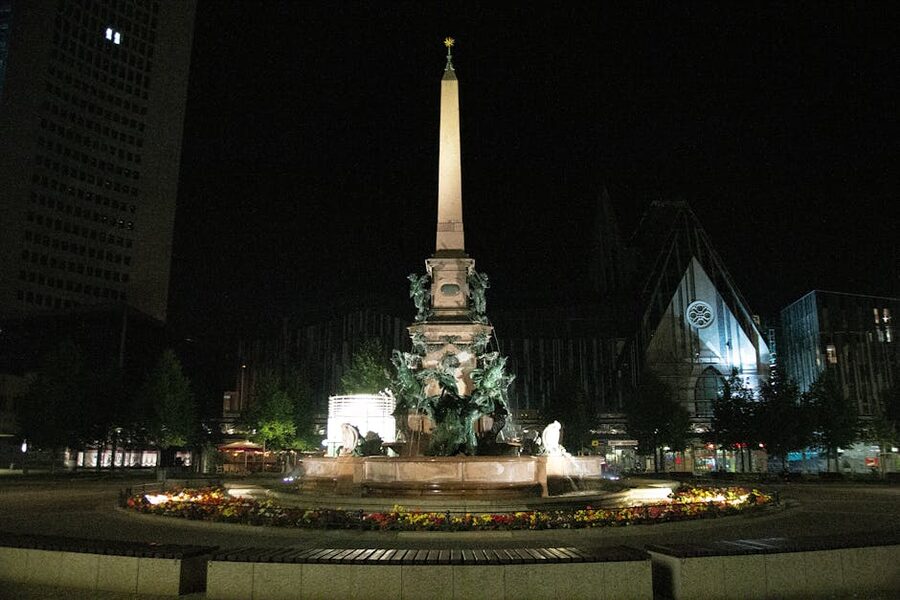 Mendebrunnen fountain in Leipzig illuminated at night