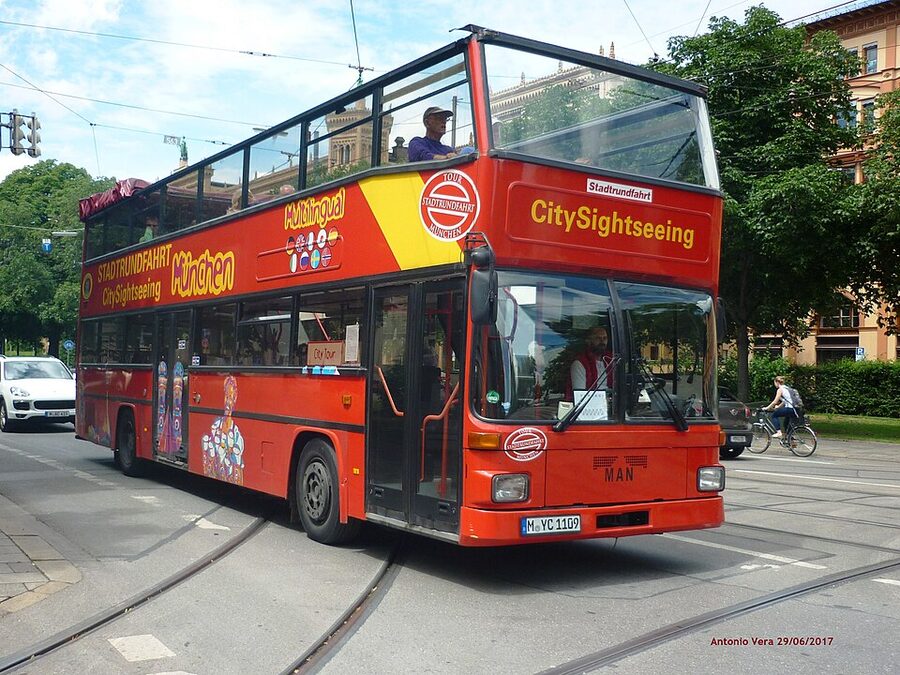City Sightseeing Munich red double-decker bus on city street
