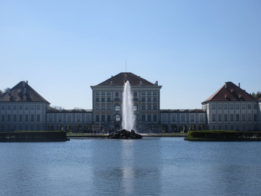 Nymphenburg Palace with fountain and reflecting pond Munich