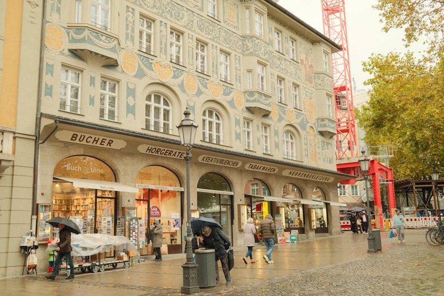 Munich rainy street pedestrians historic architecture