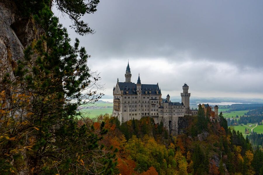 Neuschwanstein Castle in autumn with colourful foliage