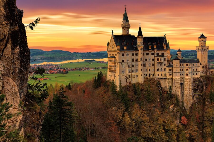 Neuschwanstein Castle at dusk with sunset light