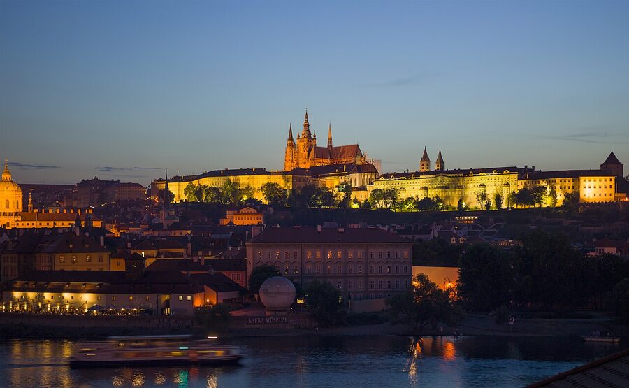 Prague Castle at dusk from across the river