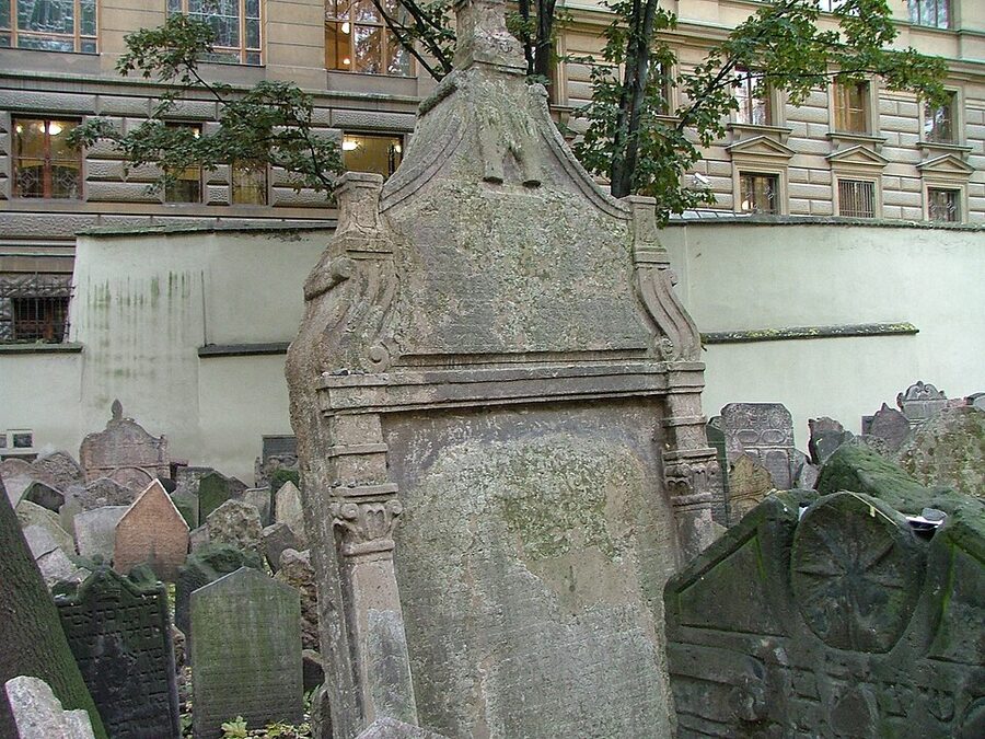 Old Jewish Cemetery in Prague with crowded layered tombstones