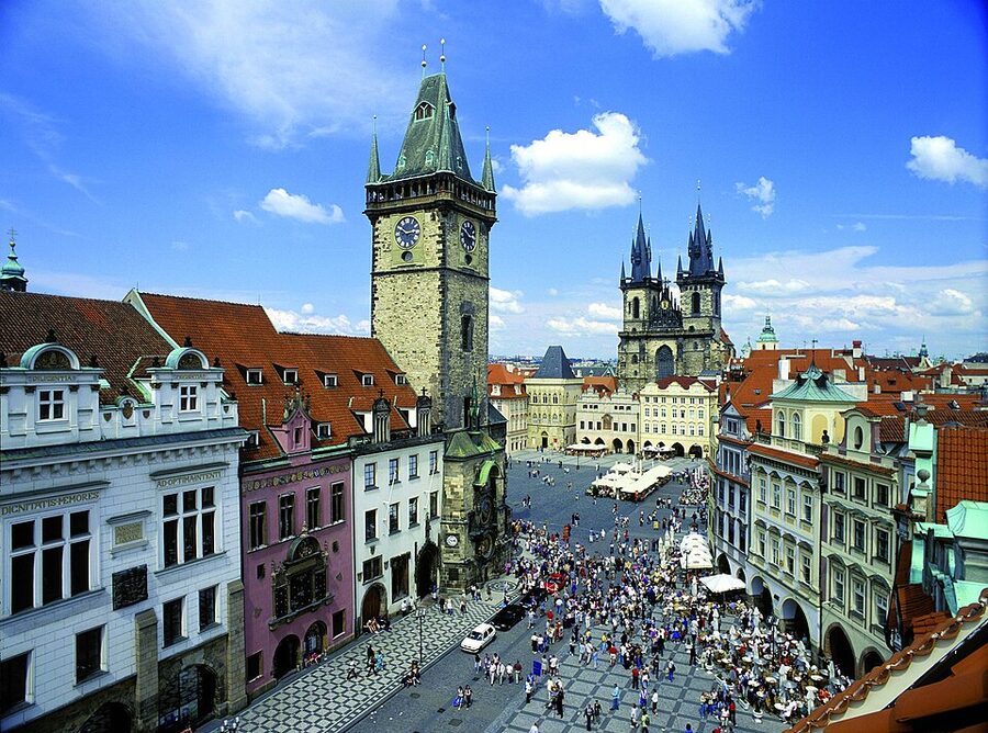 Prague Old Town Square panoramic view with Tyn Church and pastel facades