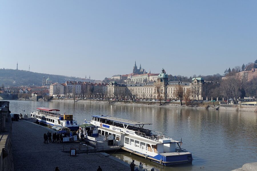 Cruise boats moored on the Vltava in Prague waiting for boarding