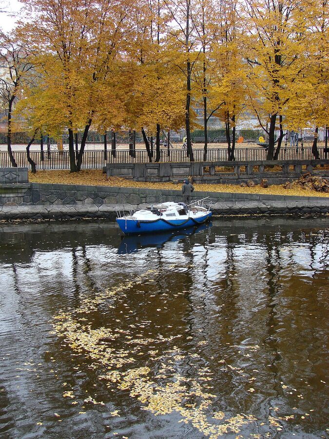 Cruise boat passing through the Smichov canal lock on the Vltava in Prague