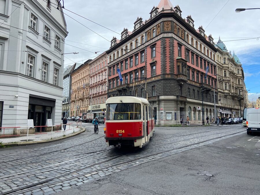 Prague tram running along the Vltava embankment