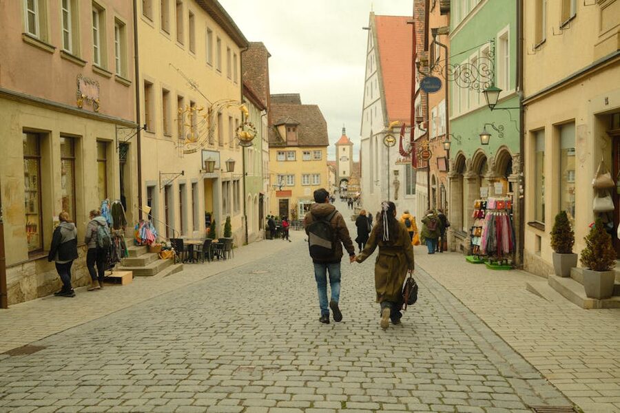 Couple walking down a charming Rothenburg street