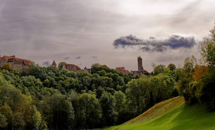 Rothenburg ob der Tauber medieval skyline framed by autumn trees