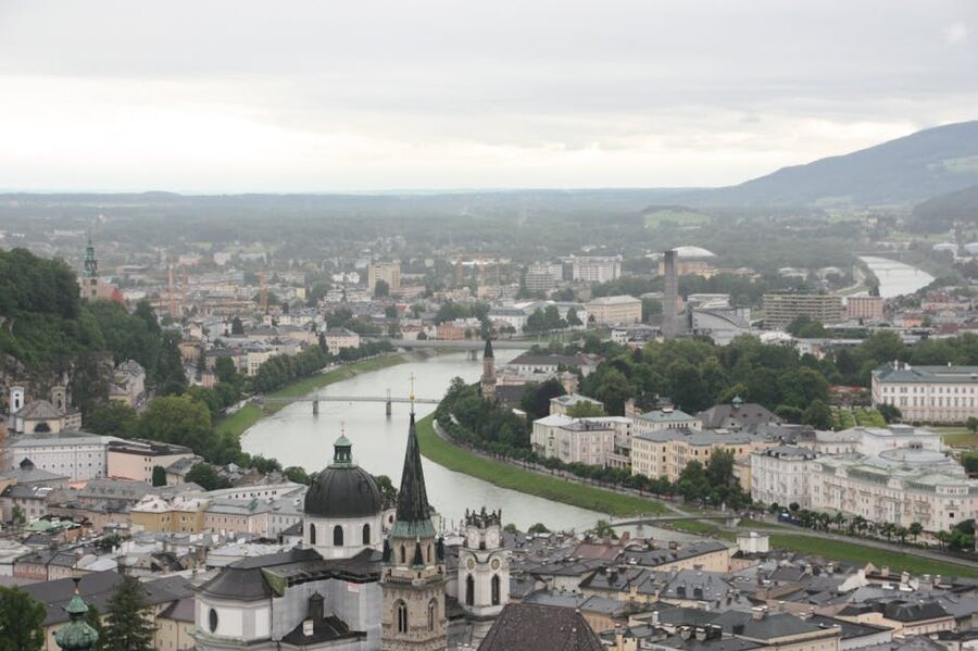 Aerial view of Salzburg with churches and the Salzach River