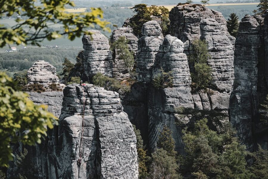 Climbers on sandstone towers in Czech Switzerland