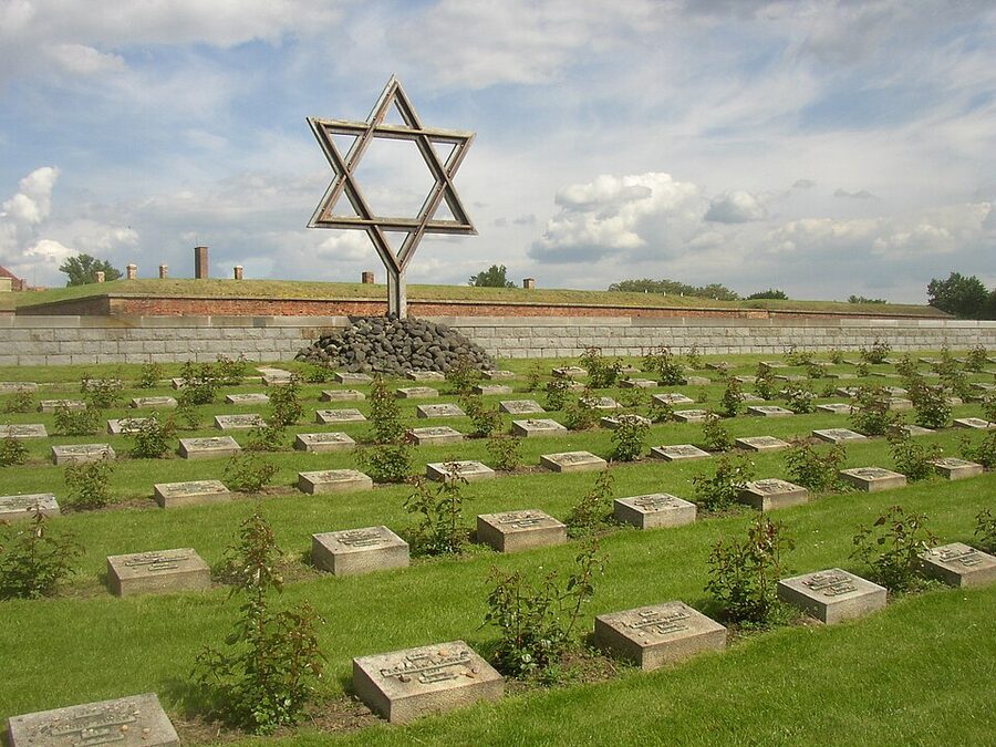 Wide view of the Terezin Memorial Cemetery with thousands of graves