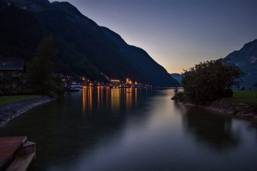 Peaceful evening view of Hallstatt with lake lights