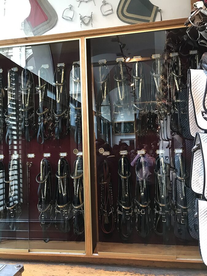 Tack room with custom saddles at Spanish Riding School Vienna