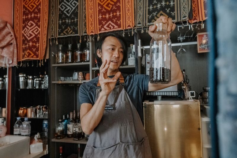 A Coffee Experience at The Sundowner - Roast, Grind & Brew - Roasting beans over an open fire