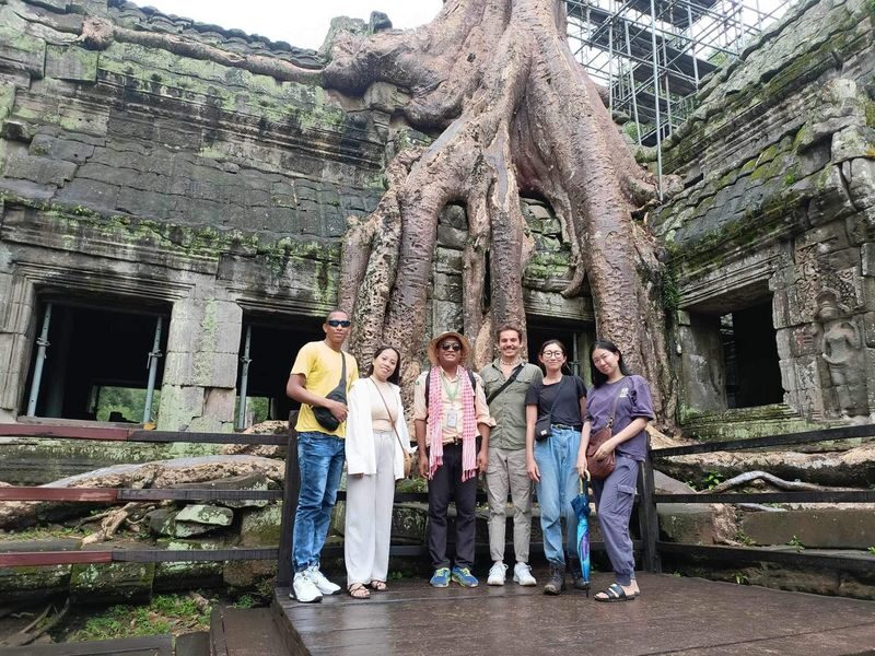 Angkor Wat Sunset Tour - Ta Prohm: stone, roots and a different mood