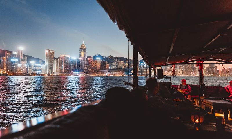 Aqua Luna Victoria Harbour Cruise Experience - Boarding at the pier, then easing into the harbor