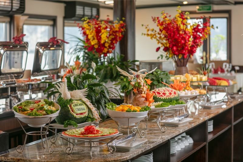 Arcady Boutique 2D1N Cruise: Ha Long Bay, Sung Sot, Ti Top - Day one: Ti Top, sunset, and dinner aboard