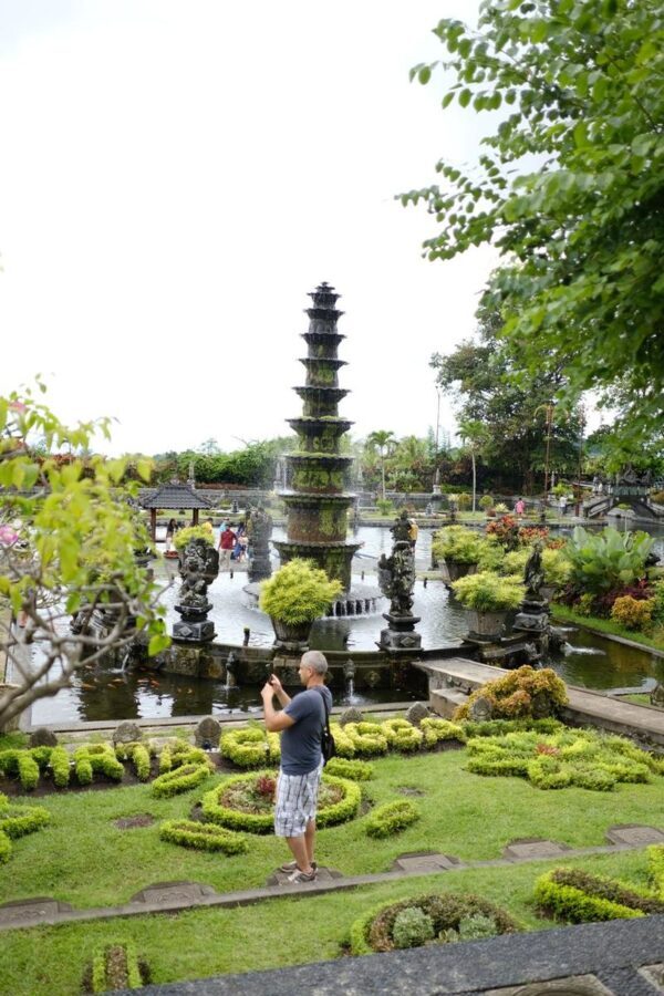 Bali Day Tour with Photographer by Camera & Drone - Tirta Gangga gives the day a slower middle