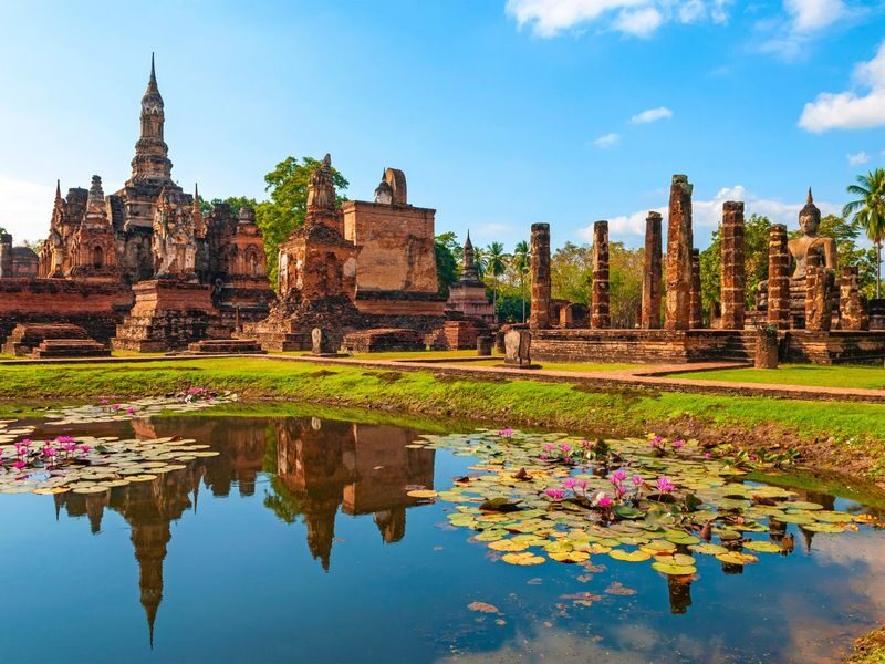 Bangkok: Ayutthaya Temples & Boat Tour with Lunch - Wat Yai Chai Mongkol beside the Pa Sak River
