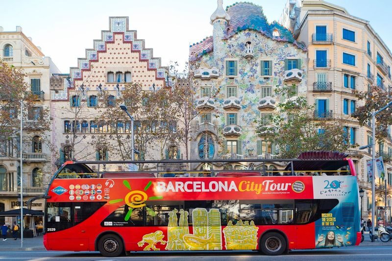 Barcelona Hop-On Hop-Off Bus Pass and Eco Catamaran Cruise - The orange route: Montjuïc, Plaça d’Espanya and Camp Nou