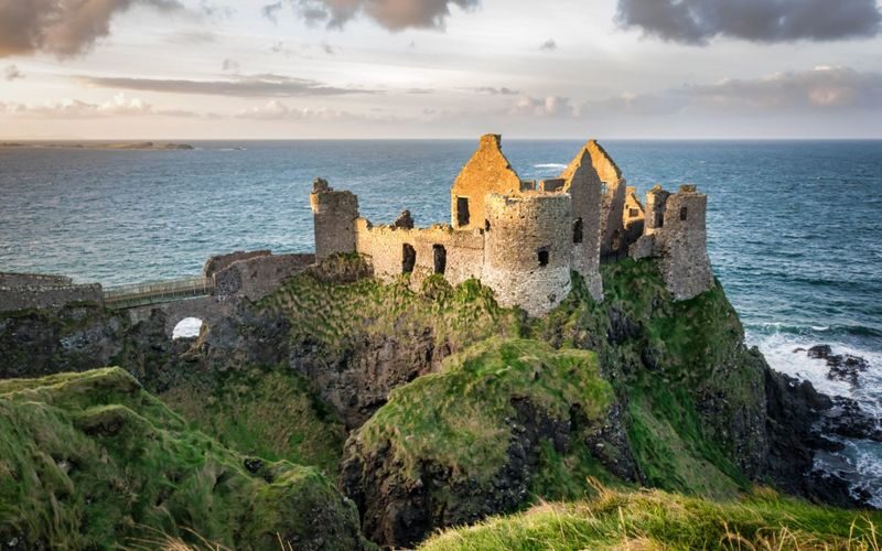 Belfast & Giants Causeway One-Day Tour from Dublin - Dunluce Castle: a striking first chapter