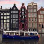 Canal Booze Cruise with Unlimited Drinks Option in Amsterdam - One Hour Through the Canals and Under Seven Bridges