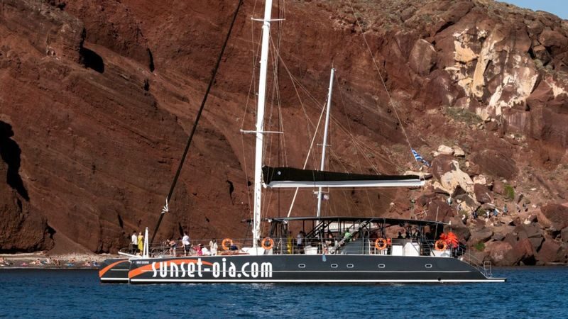 Catamaran red cruise experience with meal in Santorini - Getting to the port takes planning