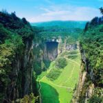 Chongqing Wulong Karst 2-Day Guided Tour including Boat Trip - Walking into Longshuixia Ground Crack