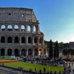 Colosseum, Roman Forum, and Palatine Hill Tour in Rome - Entering the Colosseum with a guide